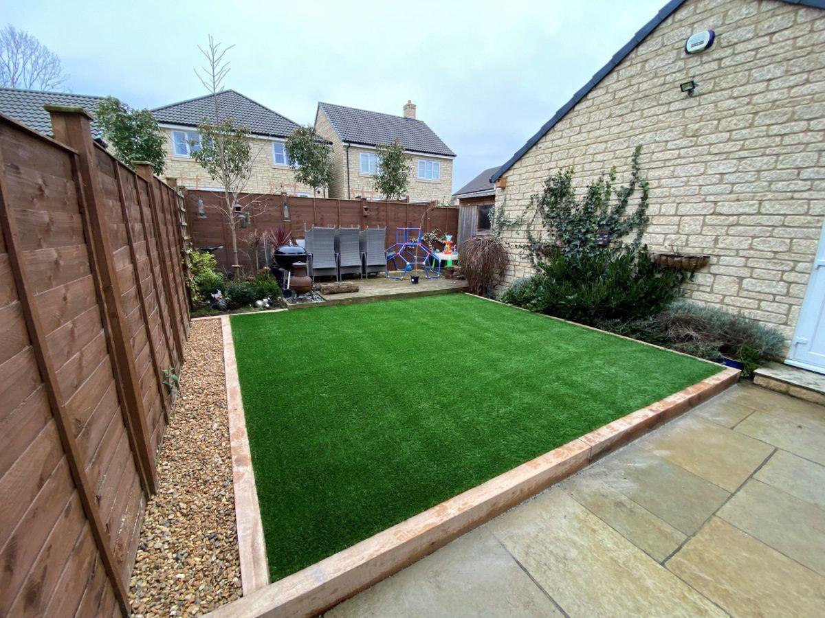 Composite decking with artificial grass