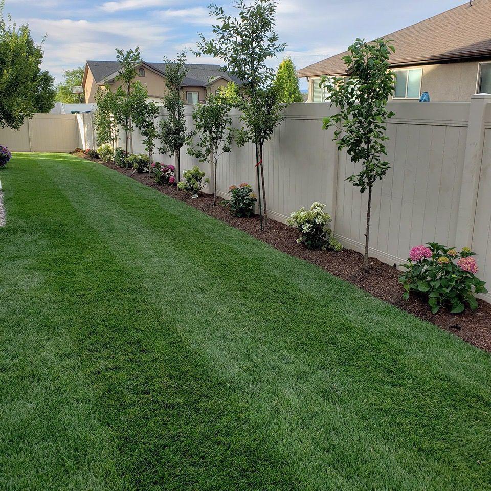 Artificial grass with white fencing