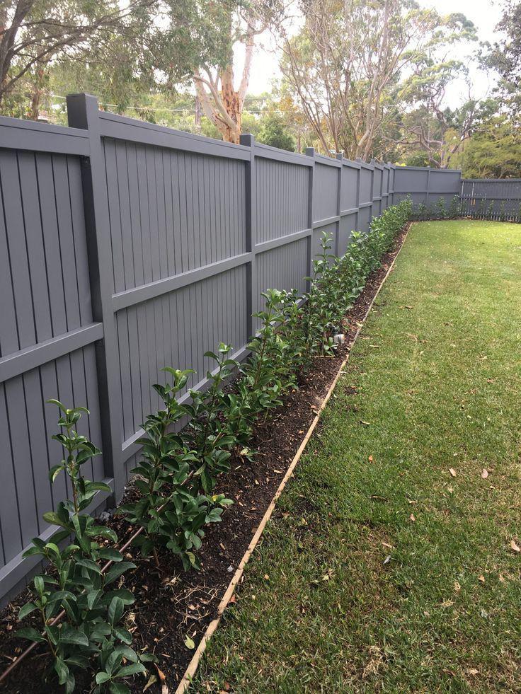 Modern grey panel fencing installation